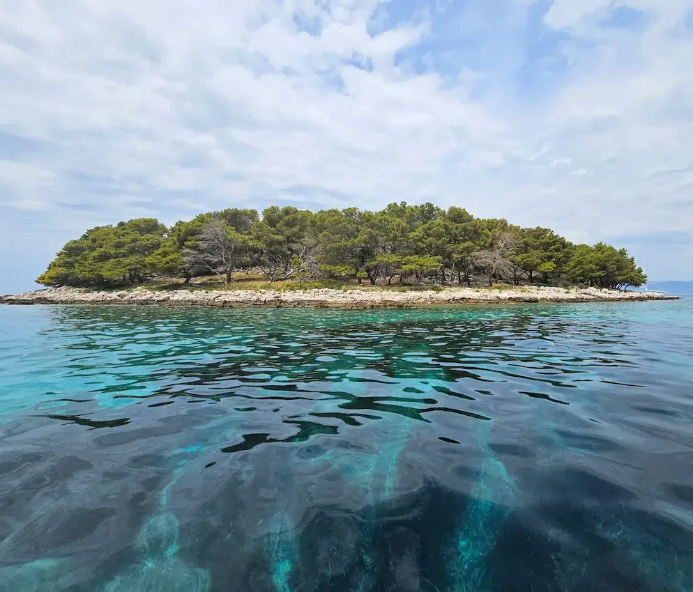 Сoastline with crystal-clear water, peaceful beaches and everyday seaside lifestyle for swimming and relaxing