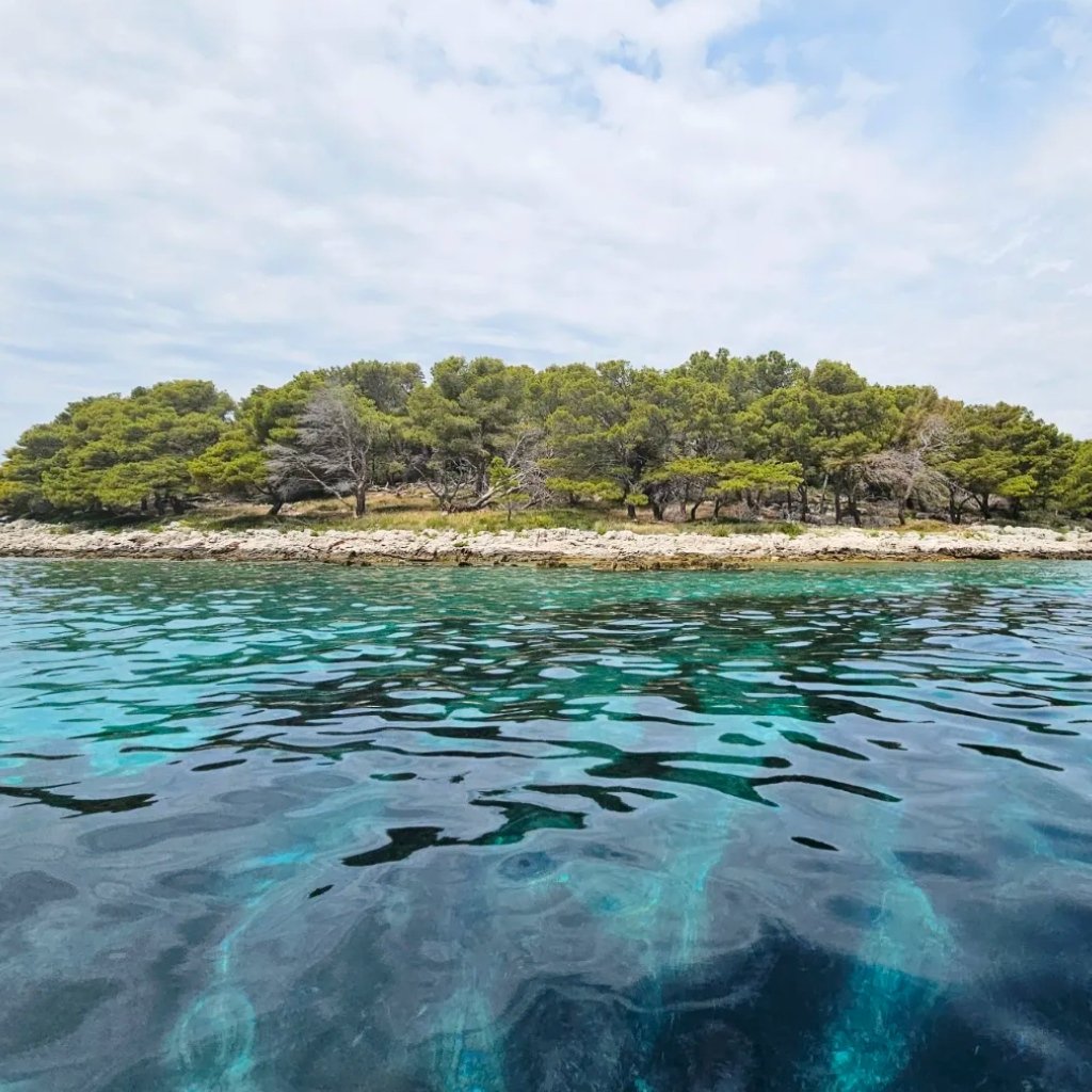 Сoastline with crystal-clear water, peaceful beaches and everyday seaside lifestyle for swimming and relaxing