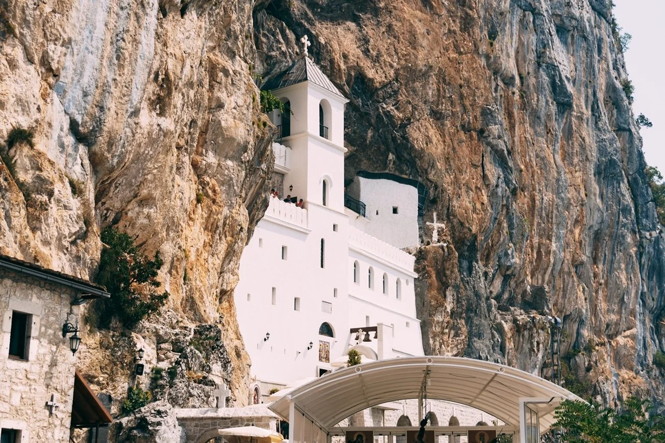 Ancient stone church set in nature with quiet atmosphere
