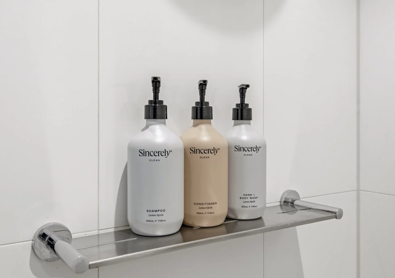 complimentary shampoo and conditioner in bathroom Southbank apartment