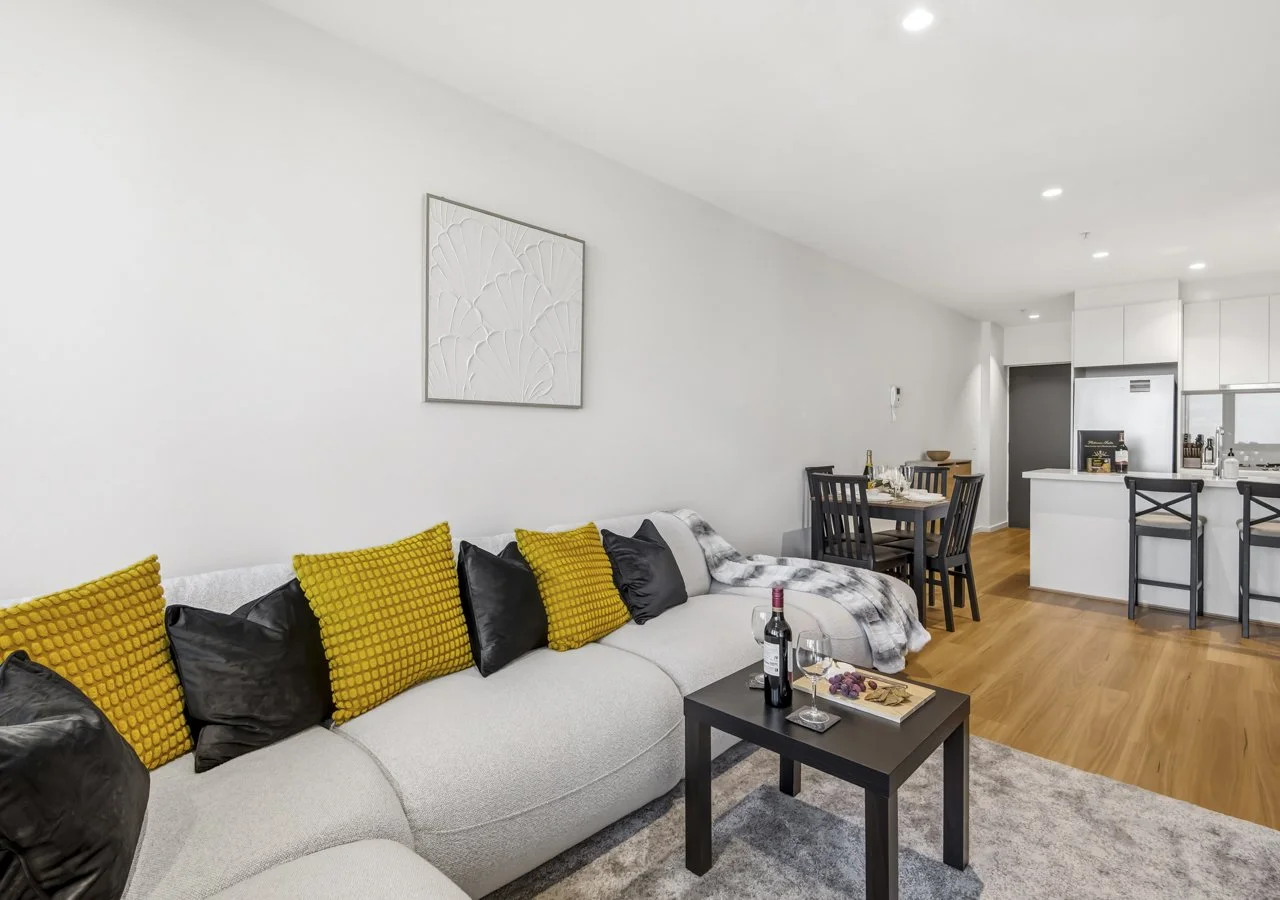 Southbank Apartment living room with sofa and TV