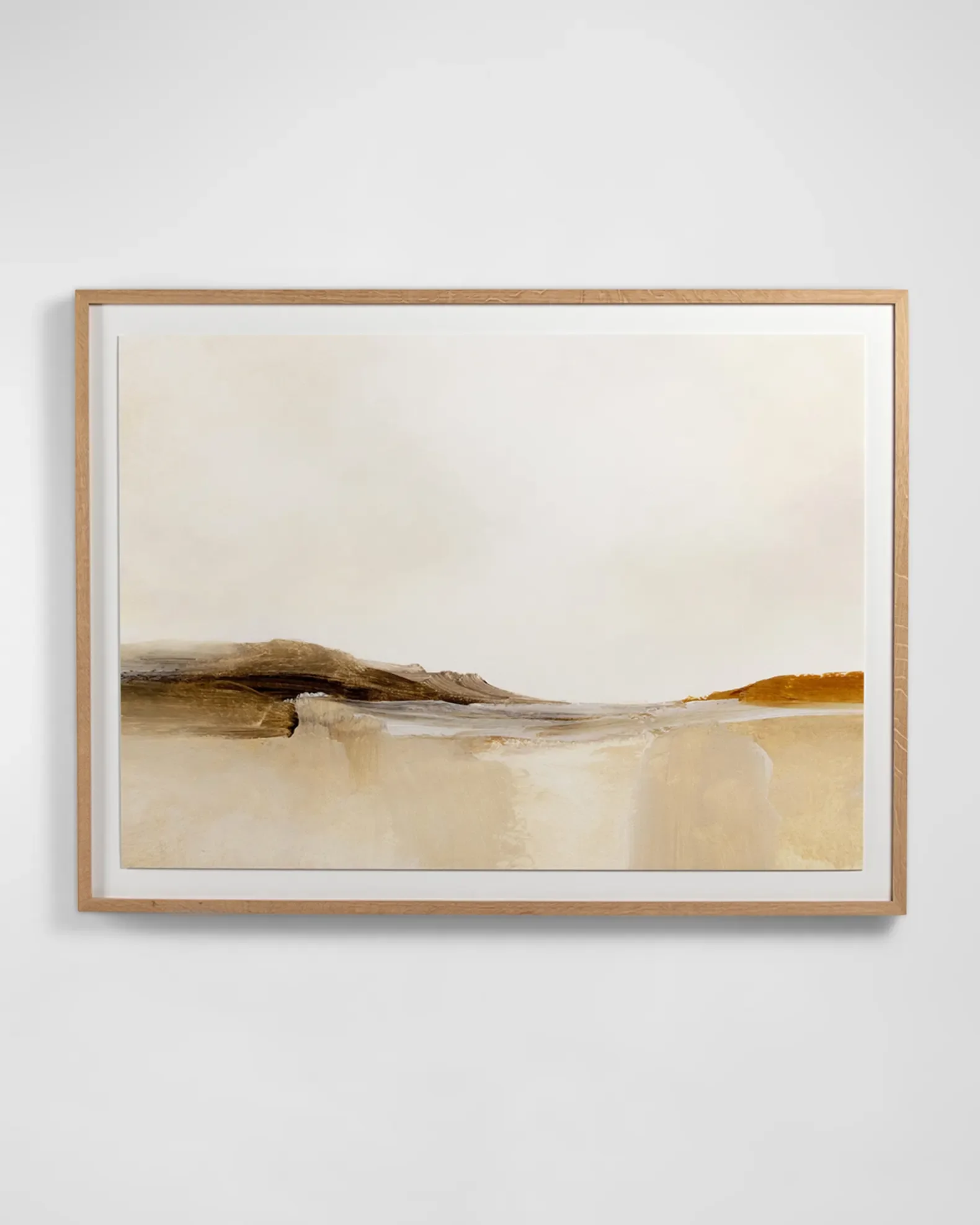 Abstract landscape painting with earthy tones, framed and hung on a white wall.