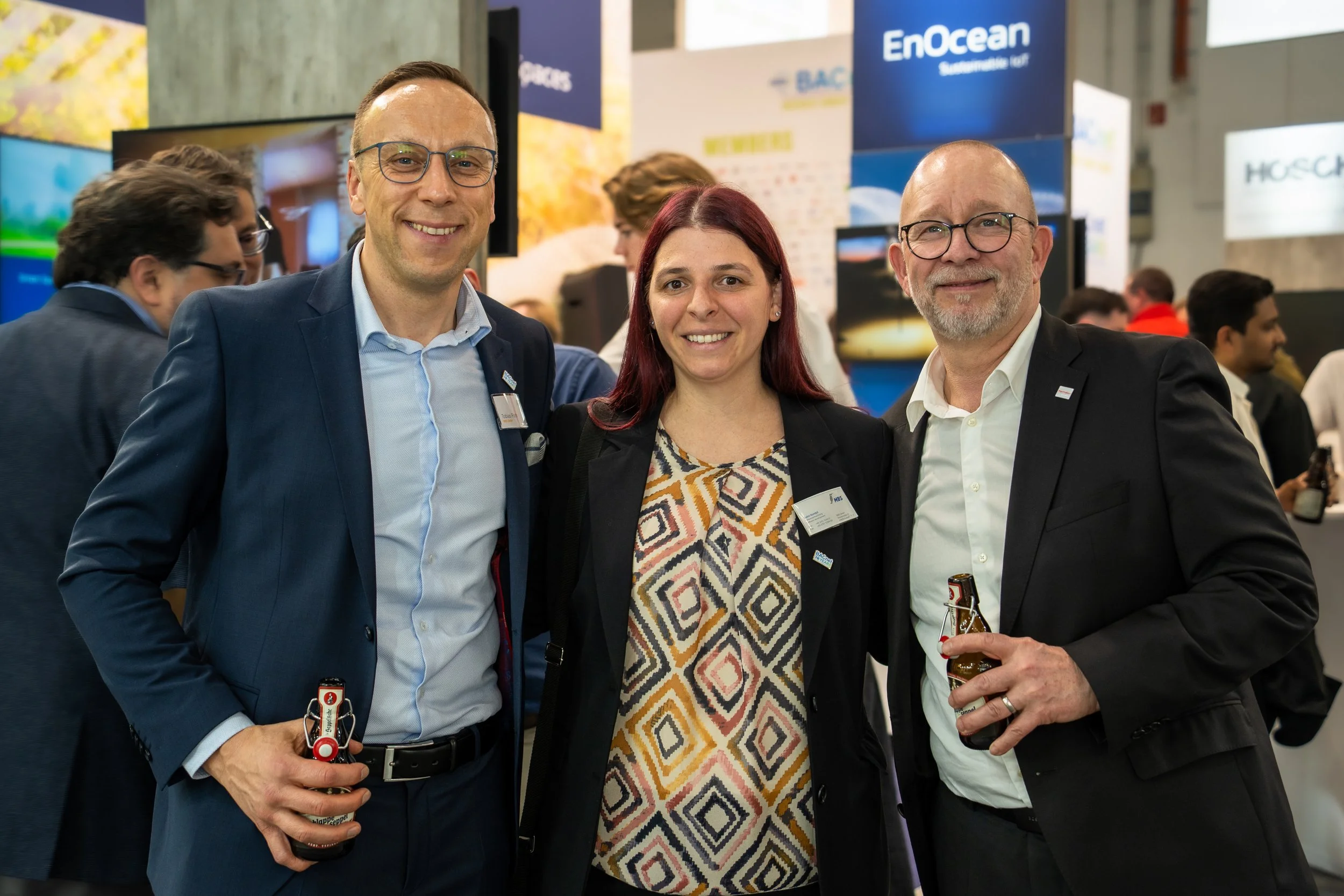 Professionals posing at trade show