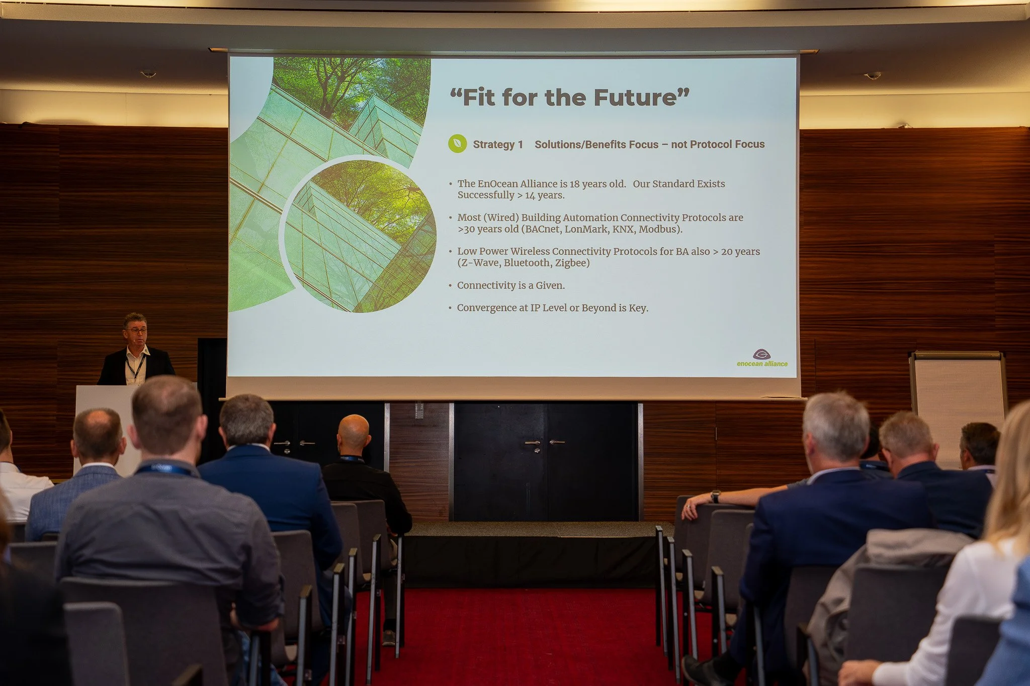 Conference speaker presenting on stage