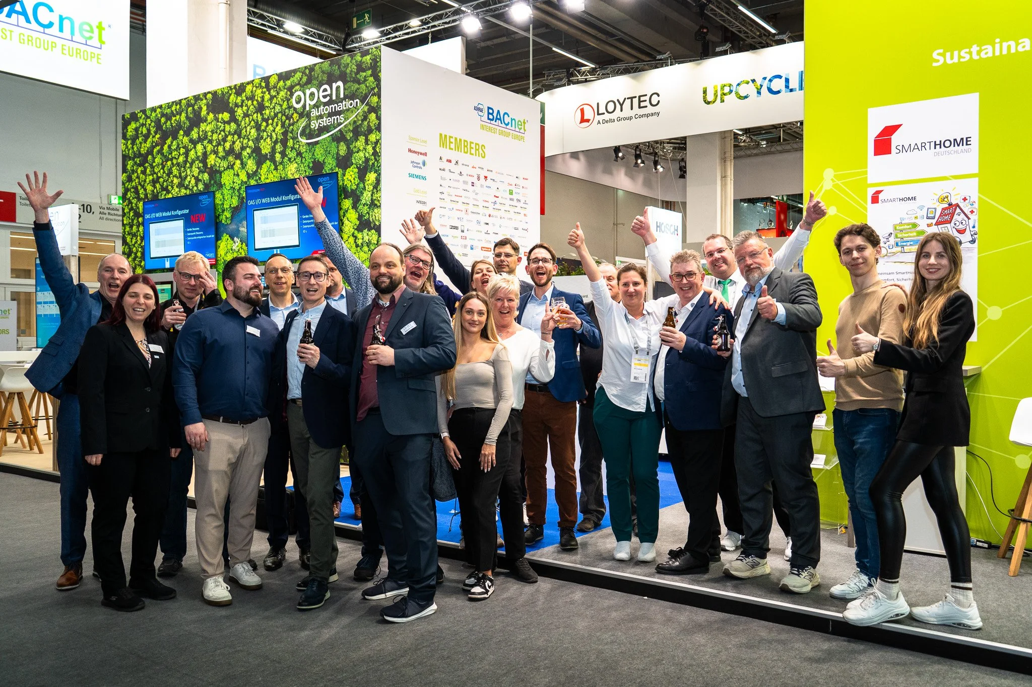 Group photo at trade show exhibition stand