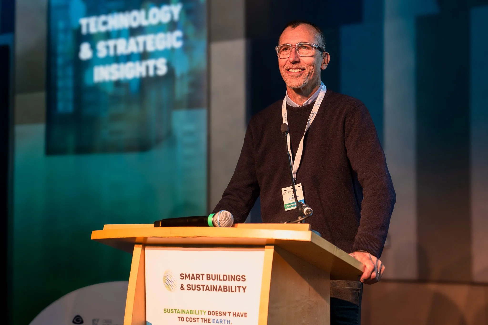 Conference speaker presenting at event