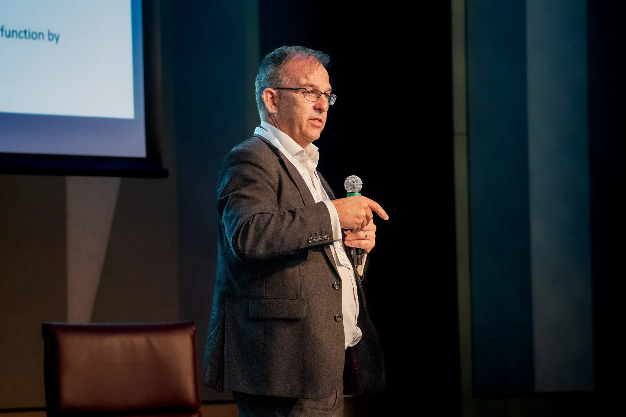 Conference speaker presenting