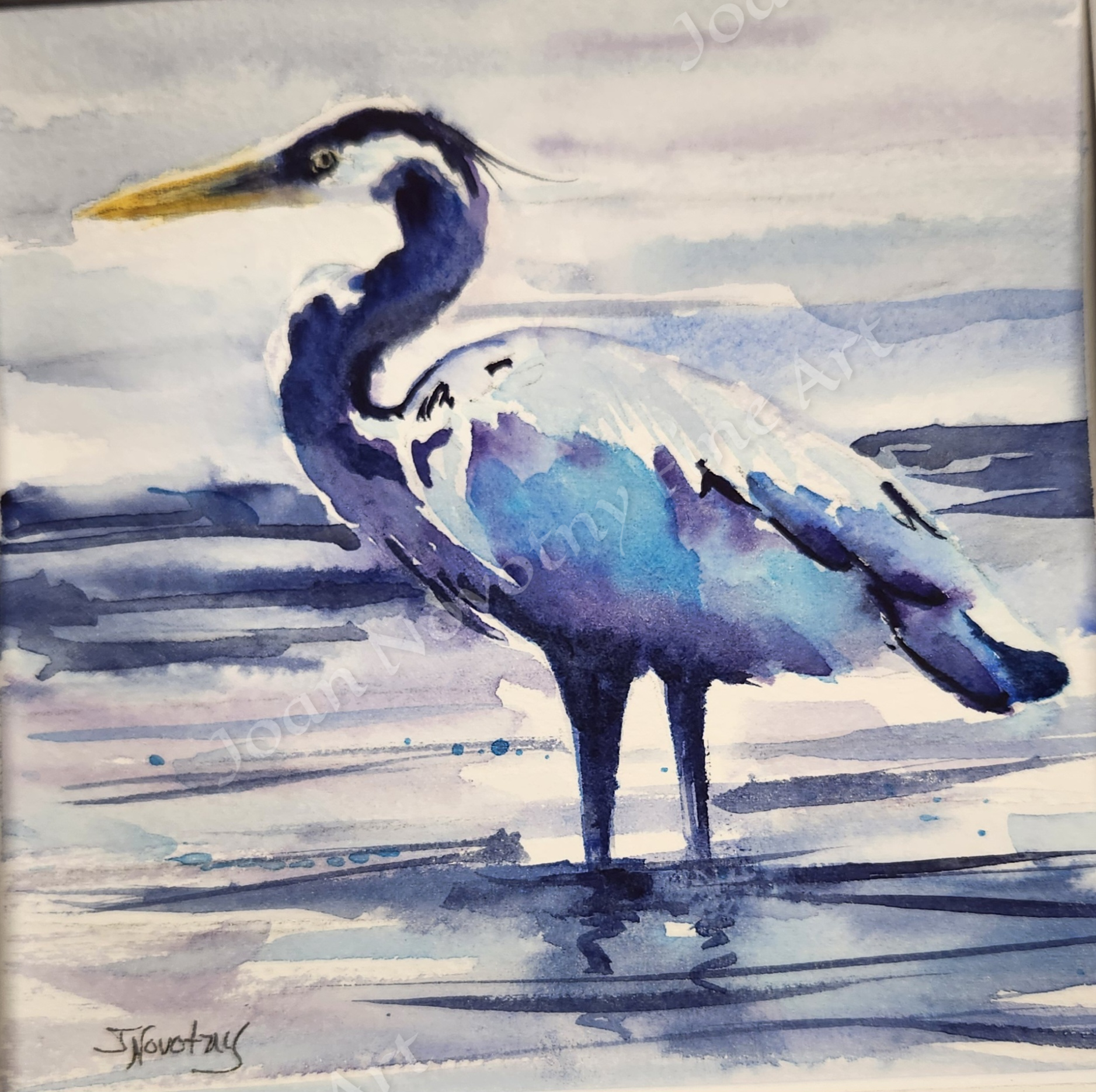 Watercolor painting of a heron standing in water, with abstract blue and purple background.