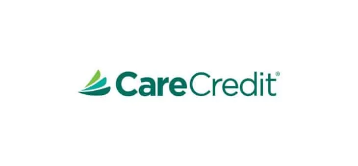 CareCredit logo with green and blue leaf icon and text on a white background