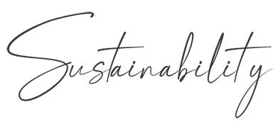 The word 'Sustainability' written in elegant cursive handwriting.