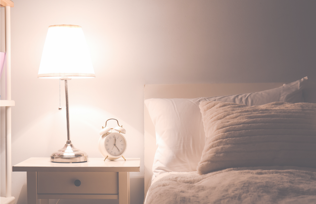 Peaceful bedroom with soft natural light, representing quiet thoughts at night
