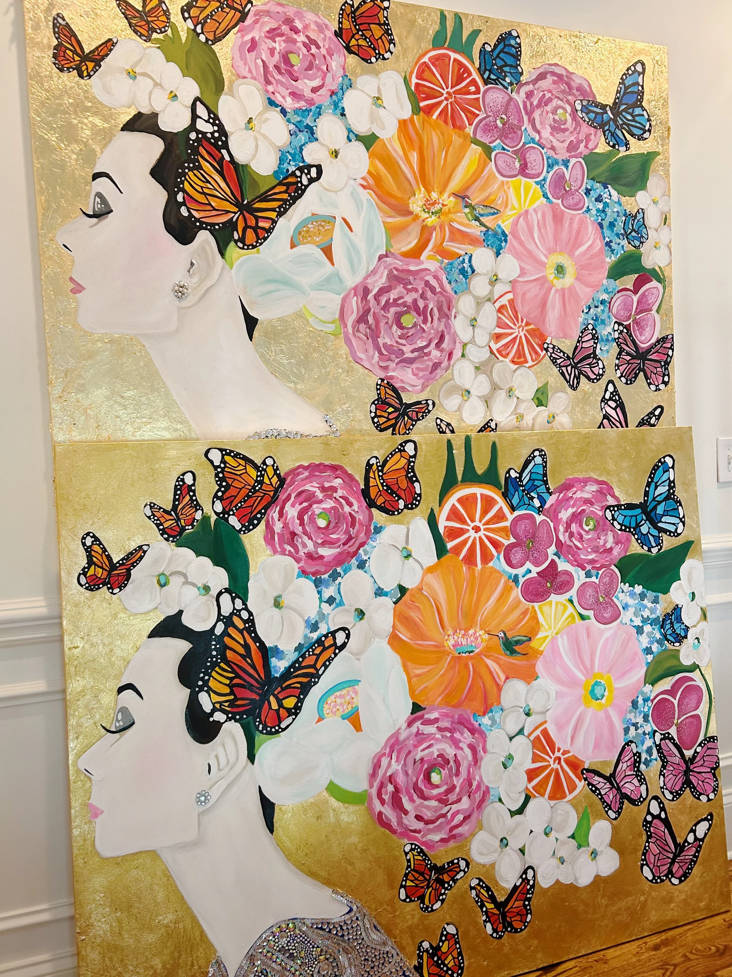 Two colorful paintings of a woman's profile with floral and butterfly elements set against a gold background.