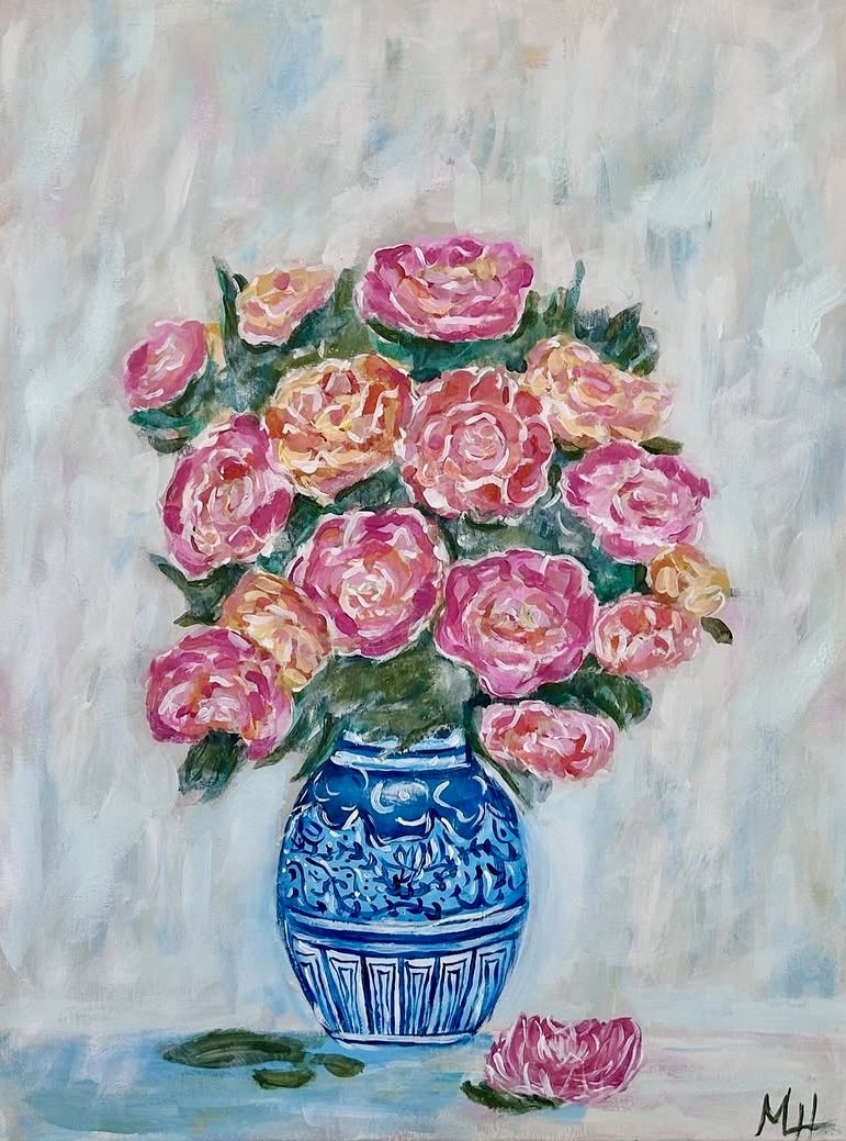 A painting of pink and peach roses in a blue patterned vase with a few fallen petals on the surface.