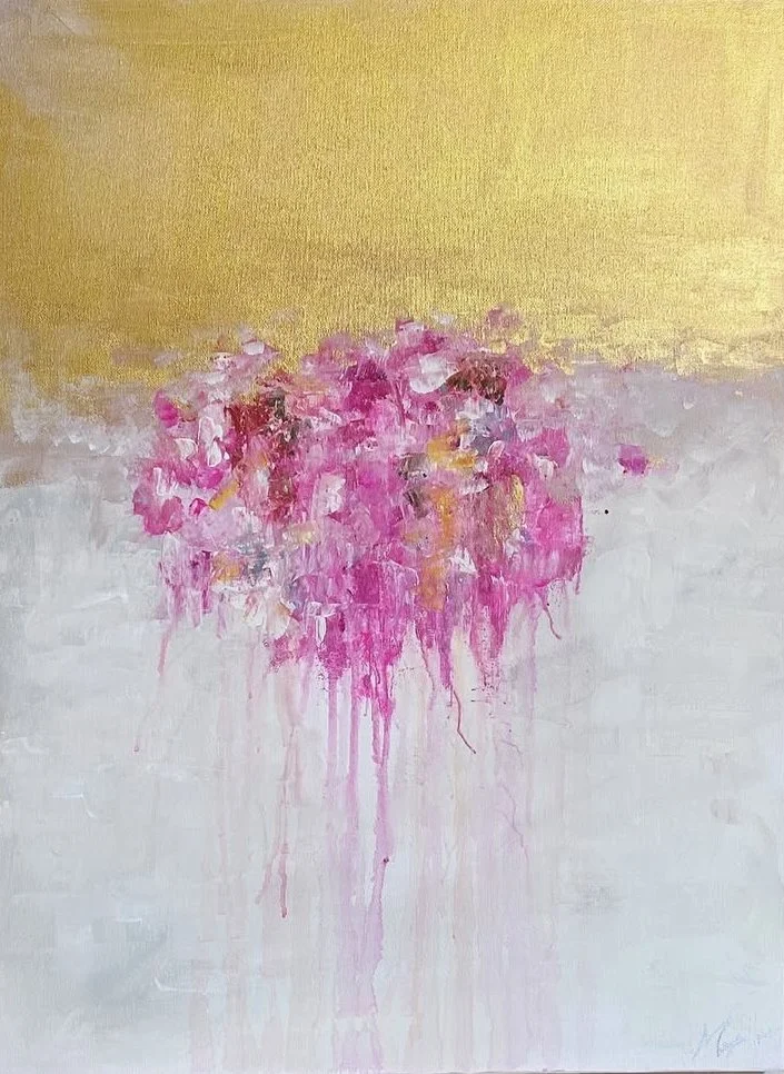 Abstract painting with gold top, white bottom, and a pink floral cluster in the center.