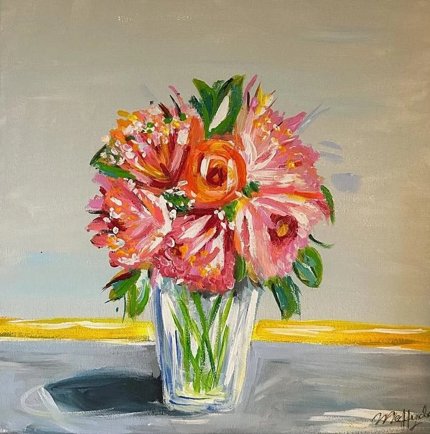 A vibrant watercolor painting of a bouquet of pink and orange flowers in a clear glass vase on a table.