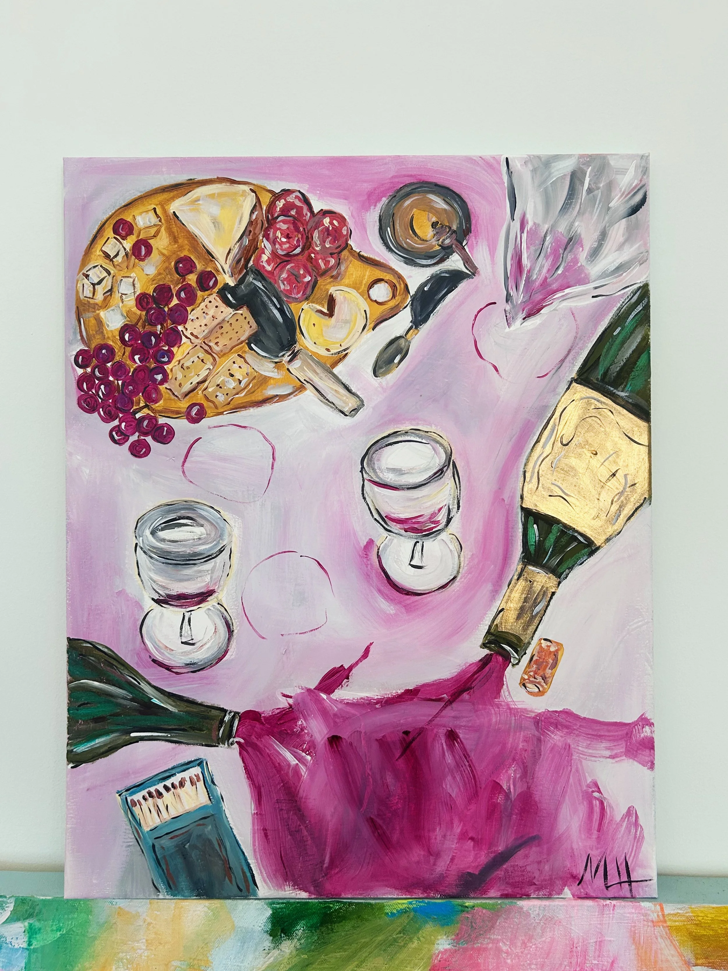 A still life painting of a table with a pink tablecloth, featuring a tray of cheese, grapes, strawberries, and crackers, two wine glasses with red wine, a bottle of champagne, and a bouquet of pink flowers.