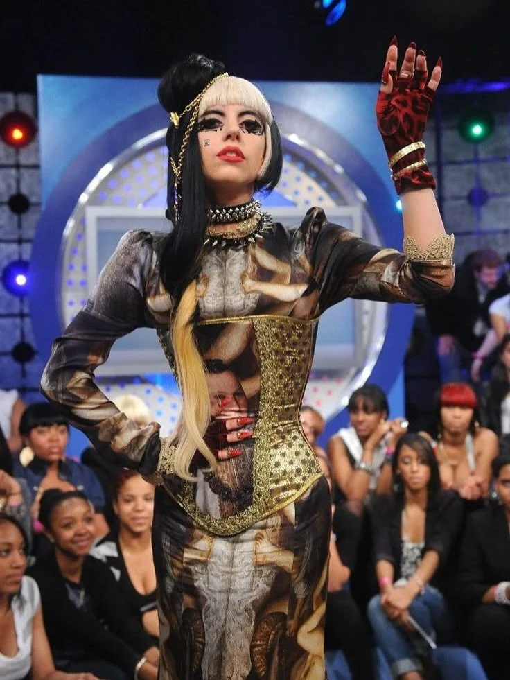 On May 23rd, 2011 @ladygaga appeared on BET&rsquo;s 106 &amp; Park show to promote her freshly released album #bornthisway. She wore @mayahansen with @wingweftgloves and Cartier and Tiffany jewelry &ndash; as well as a vintage Christian Lacroix neckl