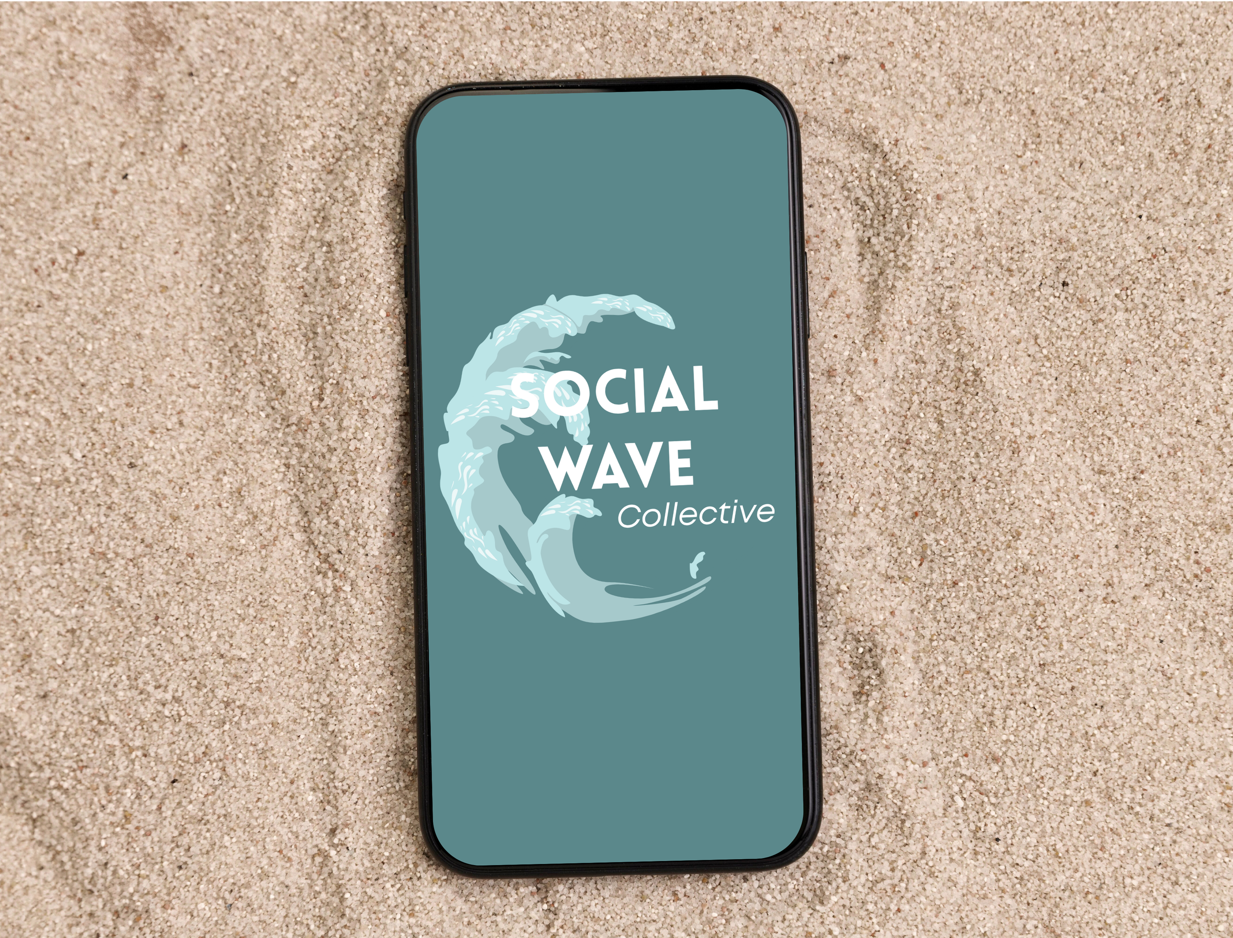 Smartphone on sand with a logo for Social Wave Collective featuring a stylized wave.