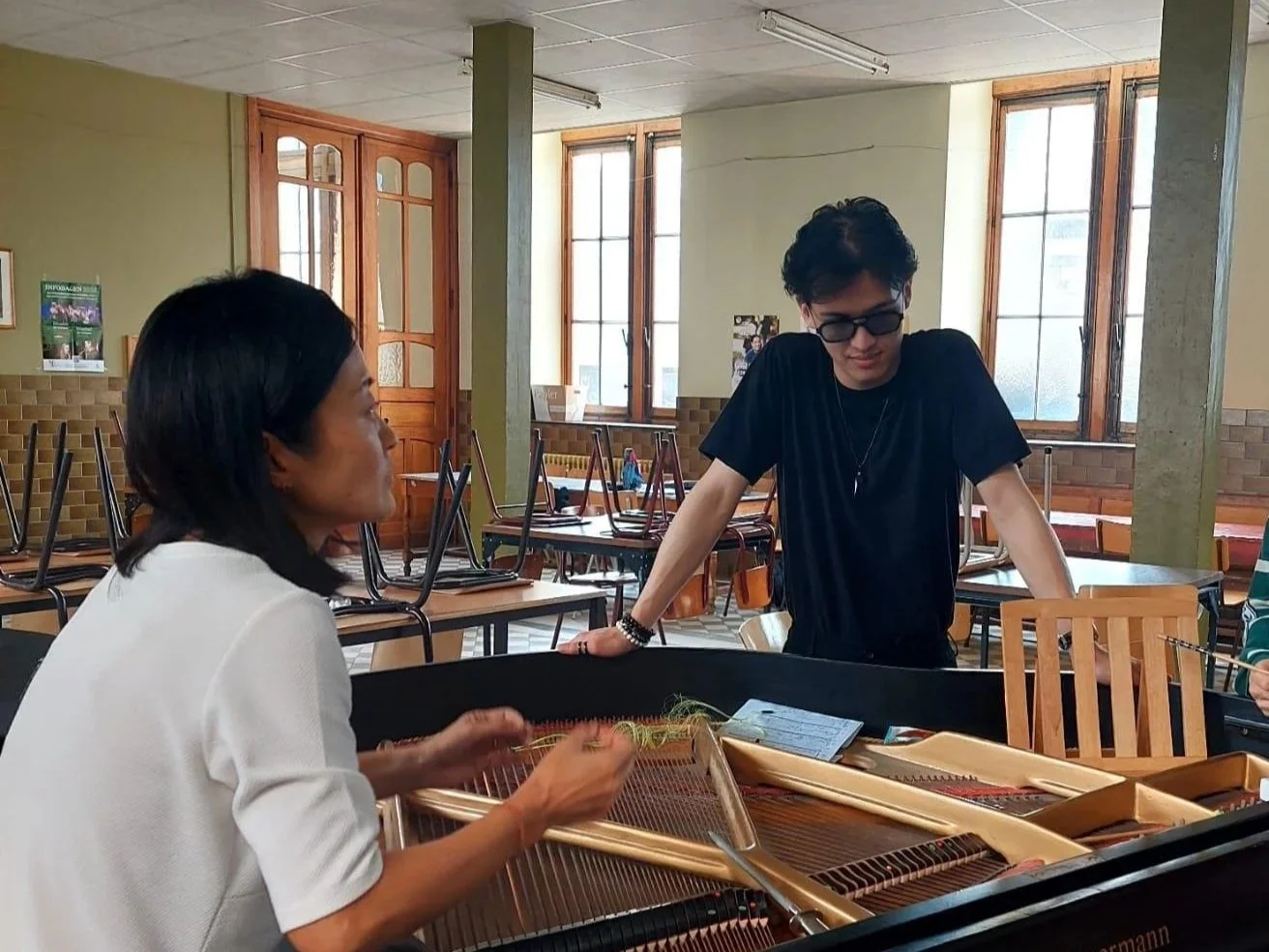 Jeremie workshopping his composition with pianist Tomoko Honda in Brussels, Belgium.