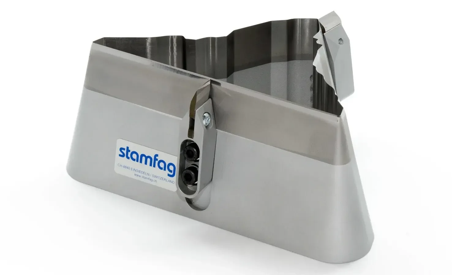 Stamfag industrial machine part with metal construction, labeled with blue and white logo.