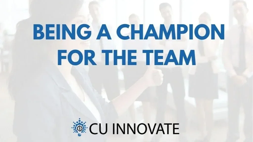 Text overlay on a blurred background of people at a professional event. The text reads: 'Being a champion for the team' in large blue font. Beneath, there is a logo with a network-like design and a dollar sign in the center, followed by the words 'CU