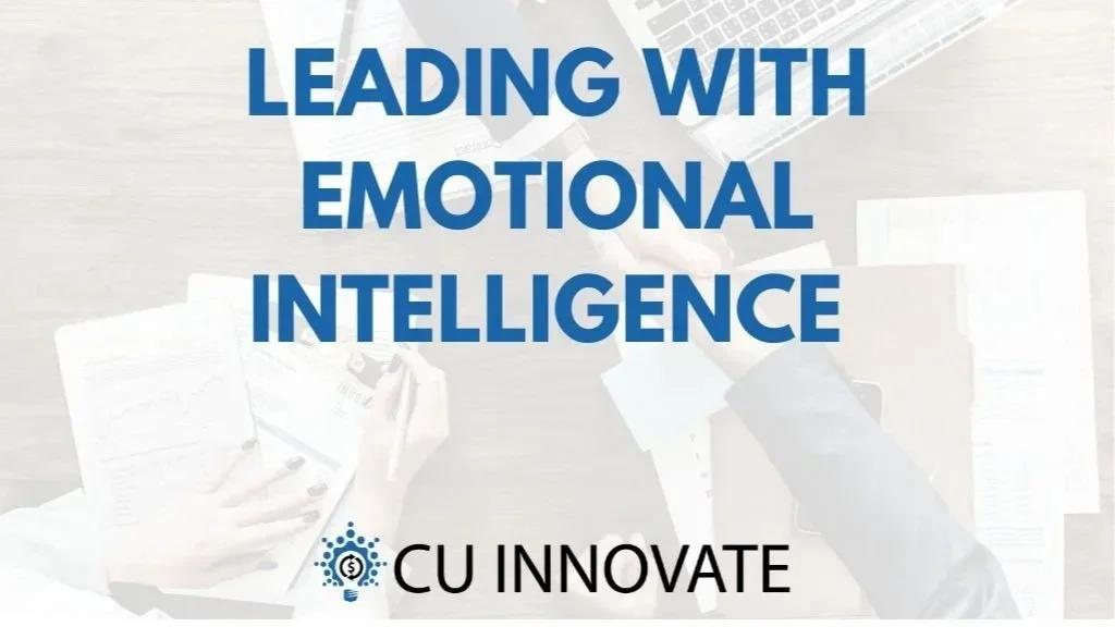 Text overlay on a blurred background of a workspace, stating 'Leading with Emotional Intelligence' and 'CU Innovate'