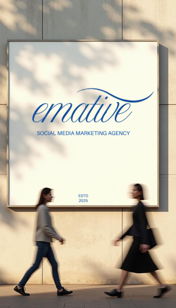 A large sign on a building wall reads "emative SOCIAL MEDIA MARKETING AGENCY," with two women walking past in front of the sign.