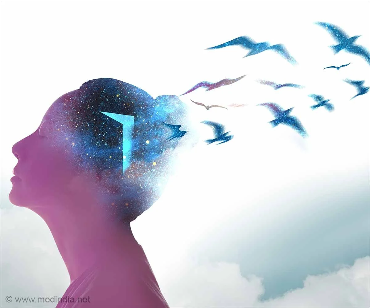 Silhouette of a woman's profile with her head filled with a starry sky, transitioning into a flock of birds flying away into the sky.
