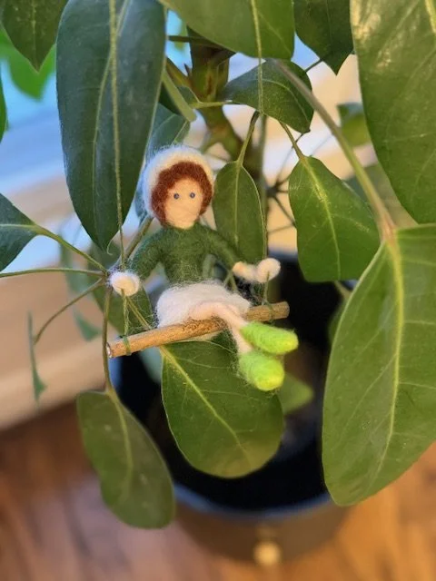 Needle felted girl in a swing