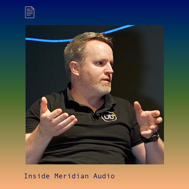 A man sitting on a chair gesturing with his hands out