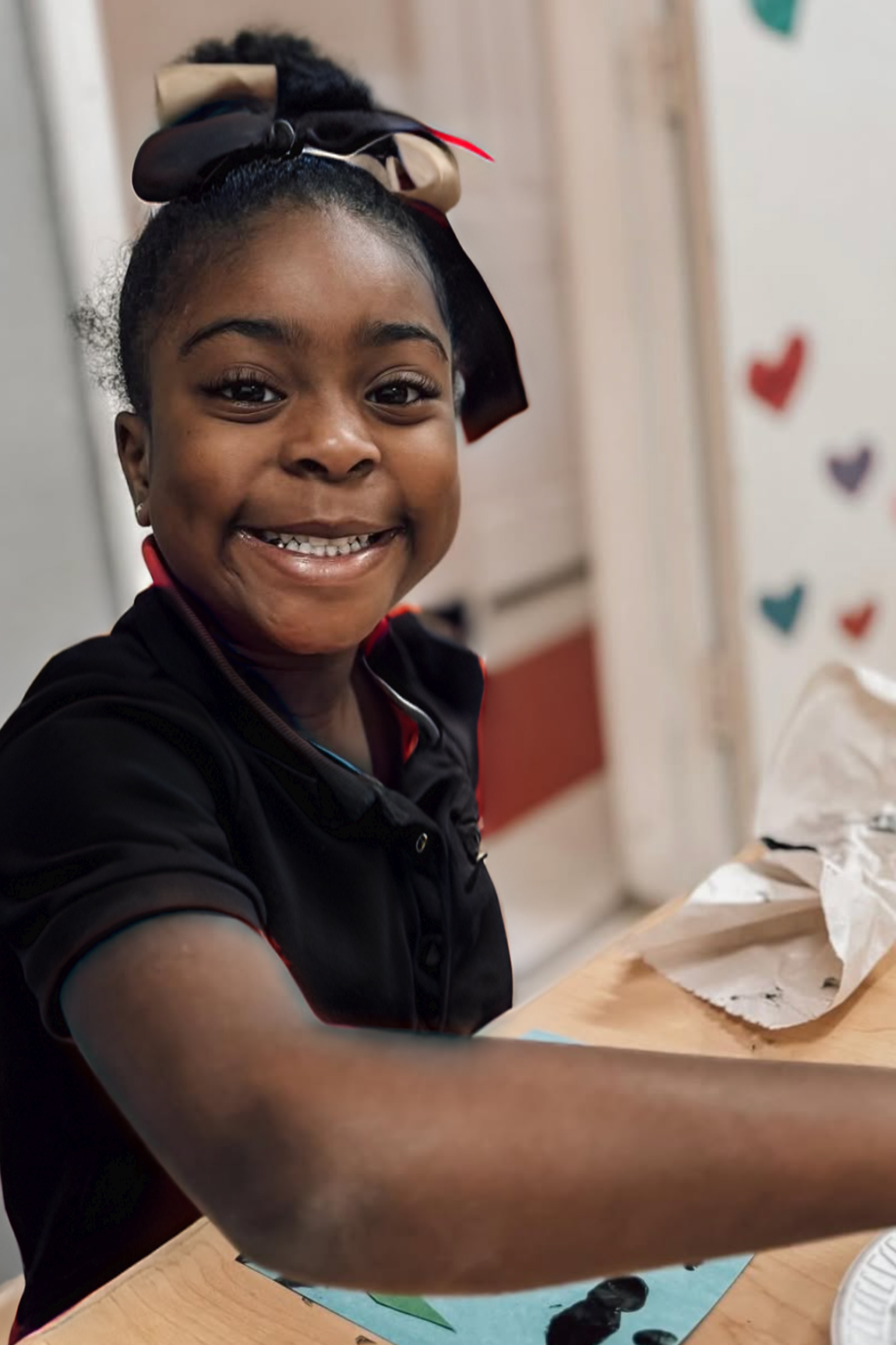 Early childhood teachers supporting student learning at Visionary Preschool in Houston, Texas