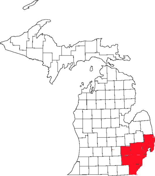 Black and white logo of a bicycle, with a red silhouette map of South America in the bottom right corner.