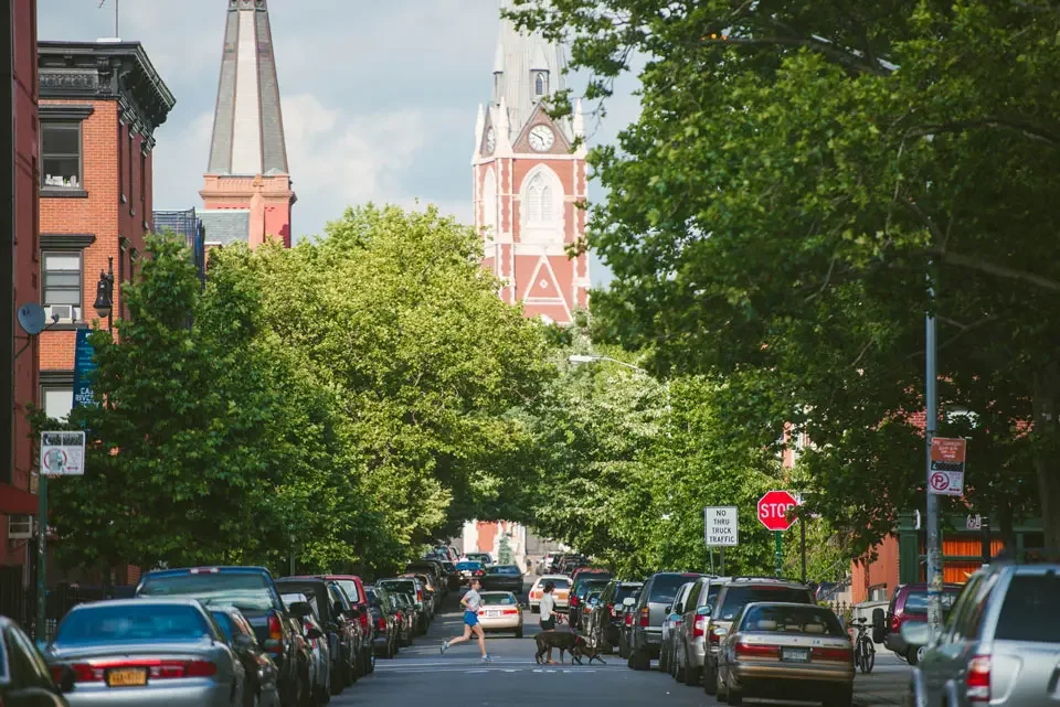A friendly, urban, clean, accessible scene of a neighborhood in Brooklyn, NY.