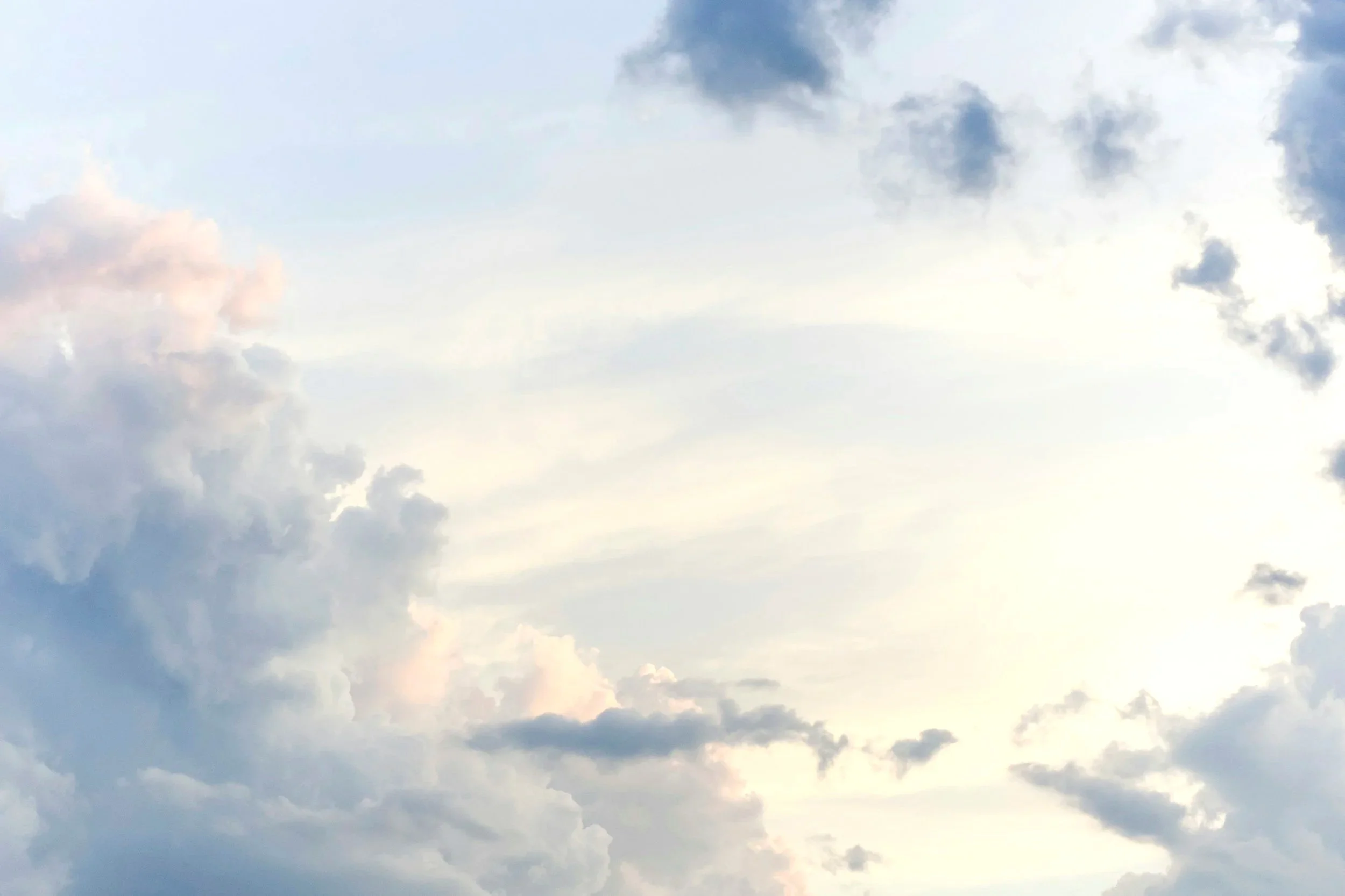 Sky with clouds and sunlight.