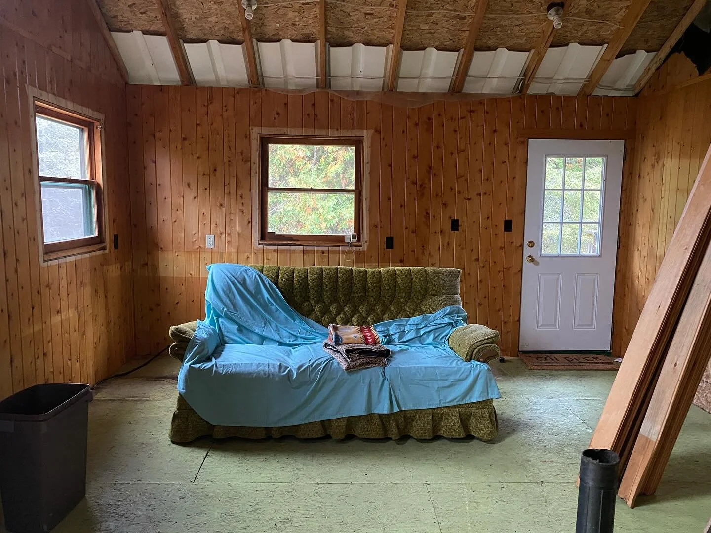 She has good bones. Knotty pine walls my dad put up himself. Plywood floors painted green &mdash; don&rsquo;t worry, that will get covered up. A couch that has seen things. No running water yet. This is where we start.