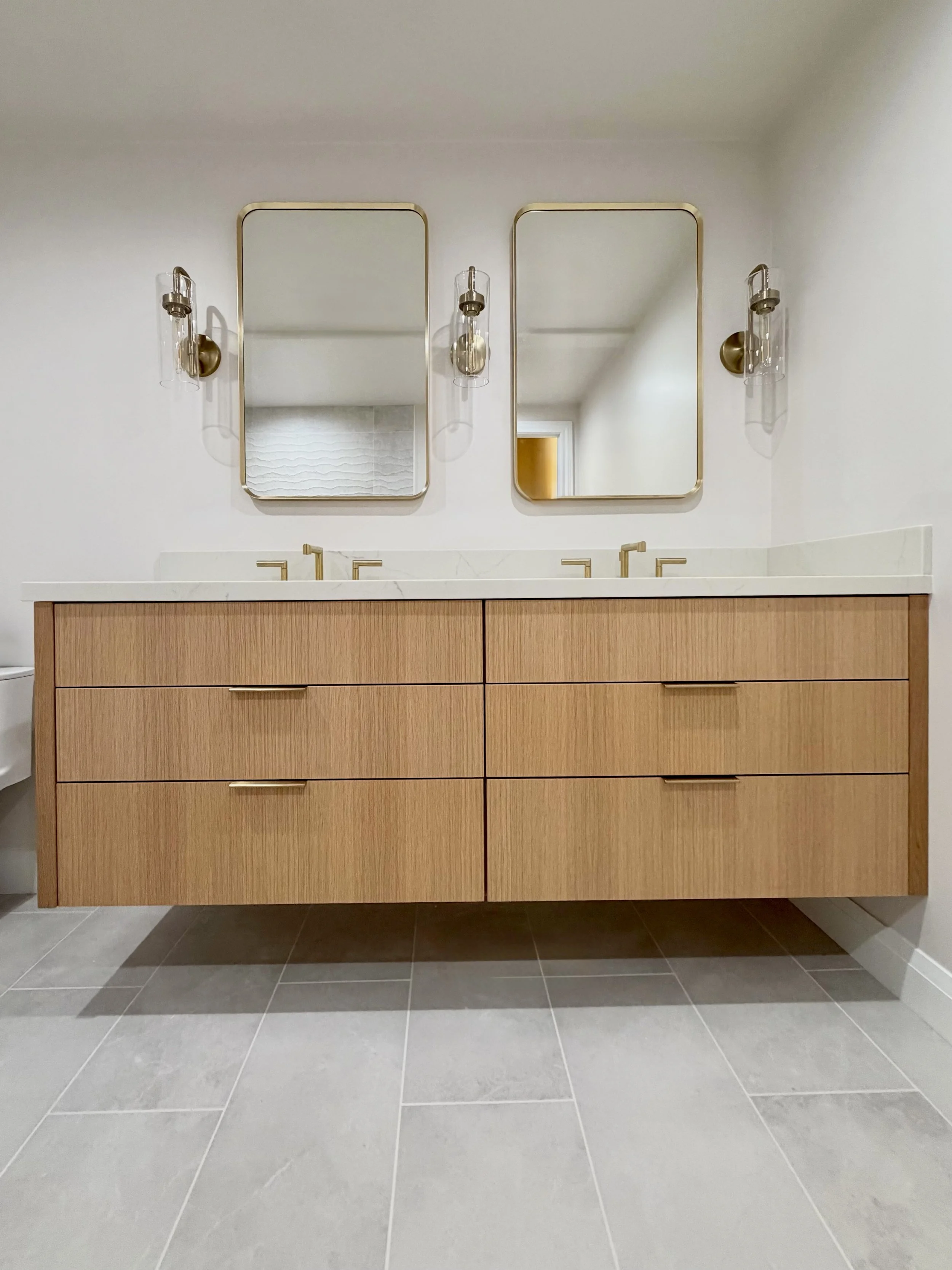 Custom floating vanity in Rift White Oak