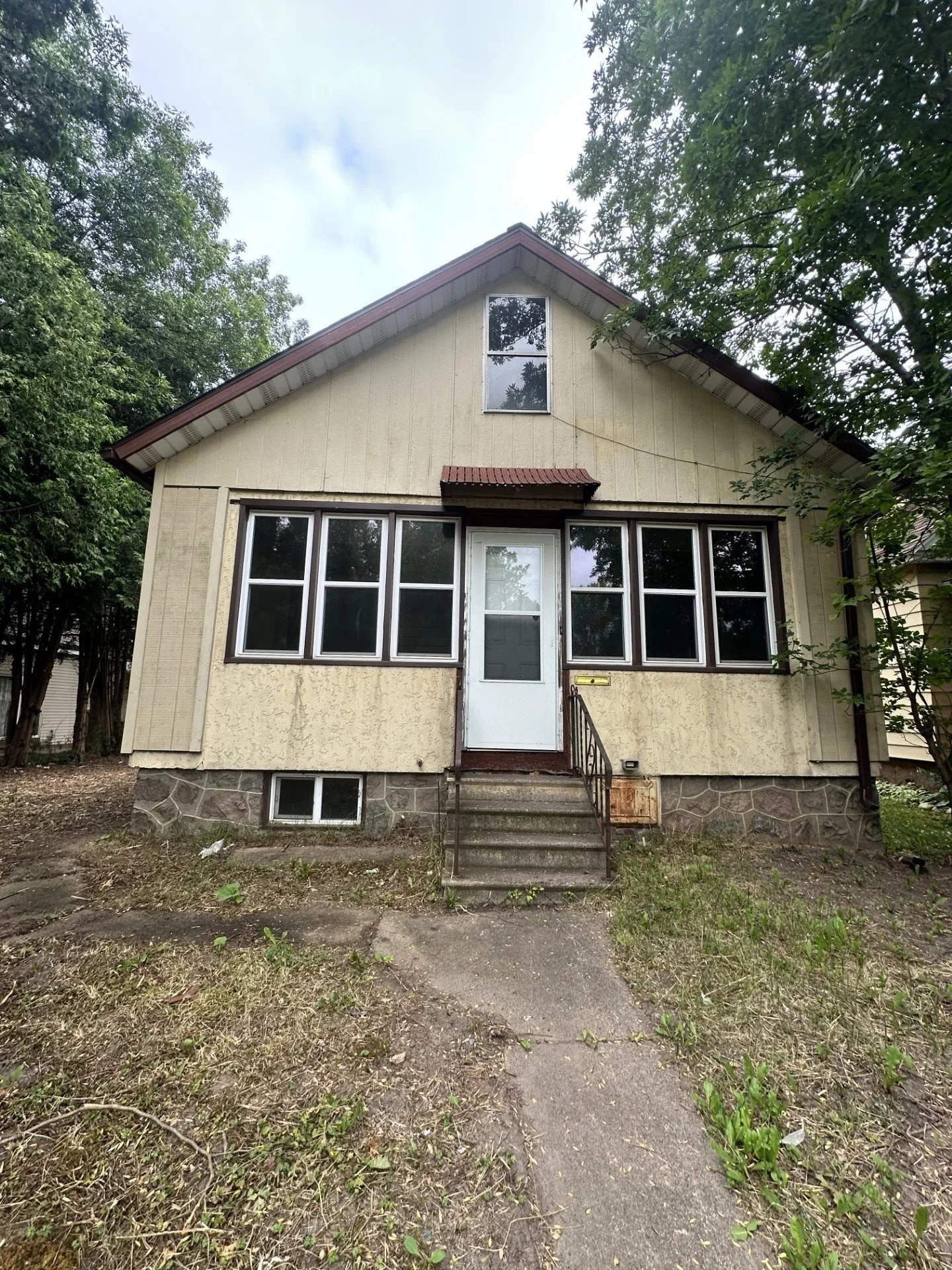 *Paint exterior 
*Remove awning
*Update stairs and railing
*Add new light fixture