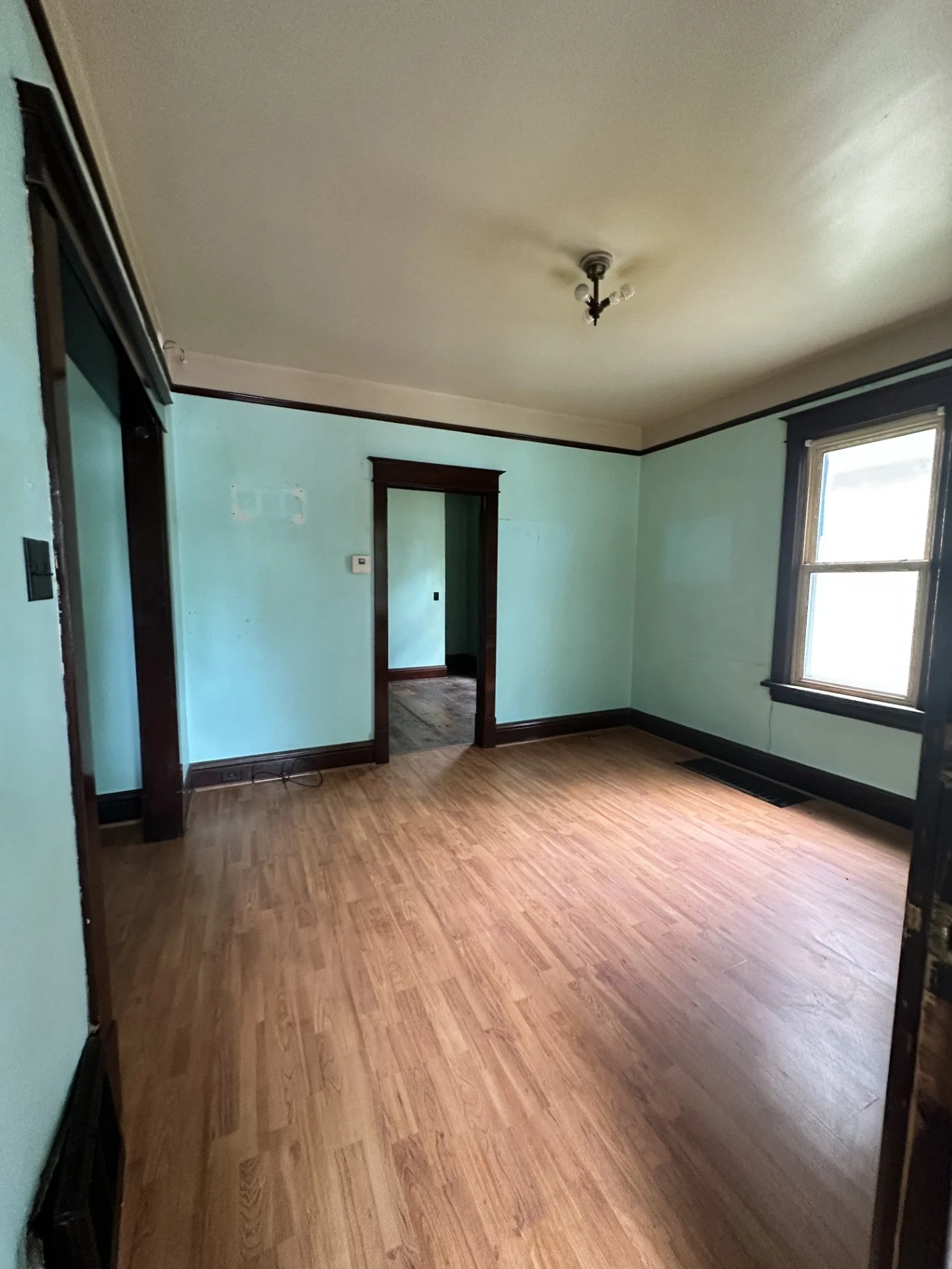 *Refresh trim - I LOVE the thick trim!
*New light fixture 
*Paint walls 
*Paint ceiling 
*New windows
*New bedroom door 
