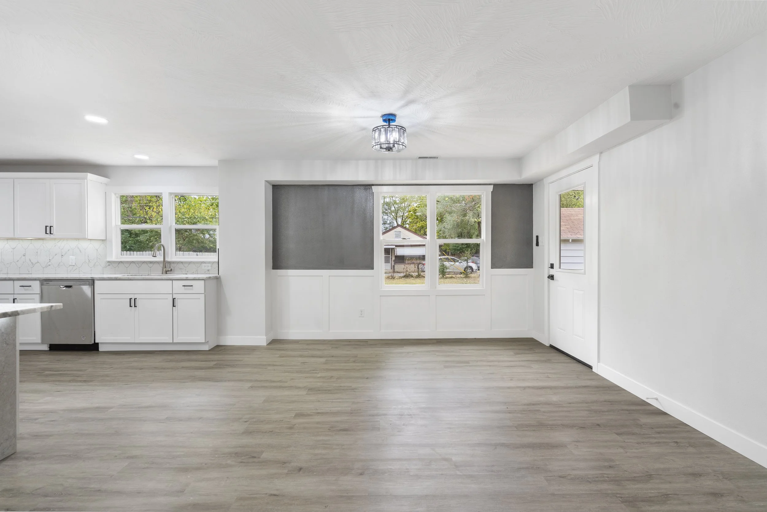 Oranssi technician working on a roof project