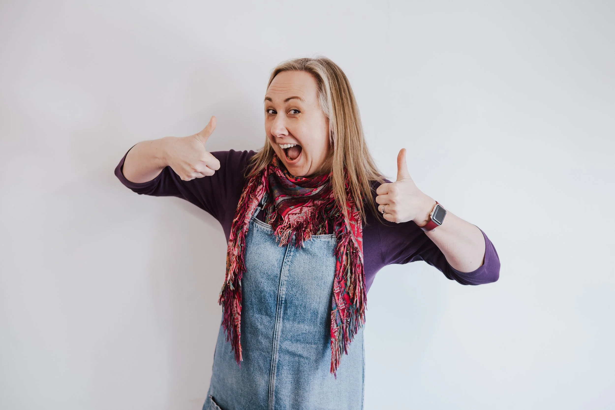 Hannah giving us a big smile with her thumbs up
