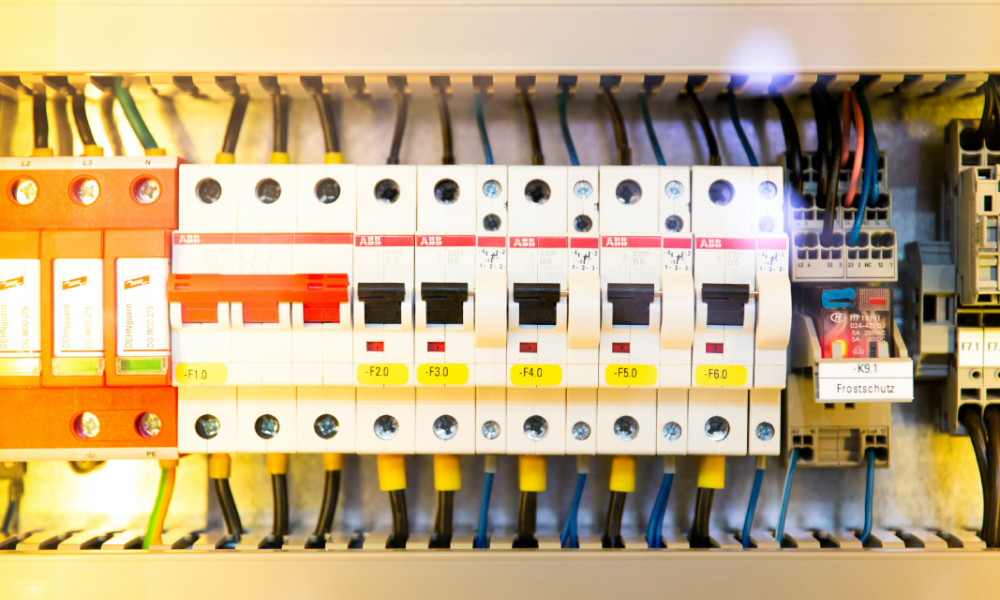 Electrical circuit breaker panel with multiple switches labeled F-1.0 to F-6.0 and a frost protection relay labeled K9.1.