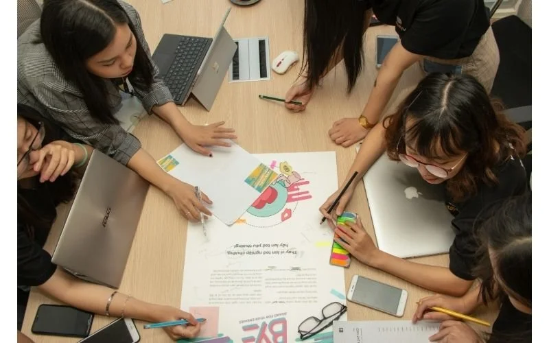 Young children playing and learning together during a group activity