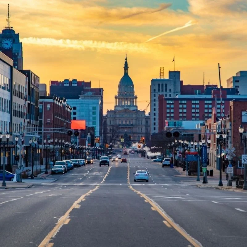 Downtown Lansing, Michigan with the State Capitol representing local STEM and STEAM programs for kids