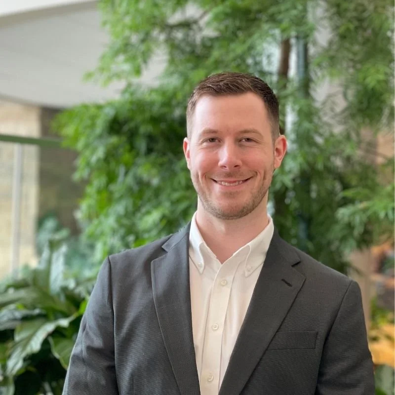Jordan Straight, founder of Michigan STEAM Kids, in a garden setting