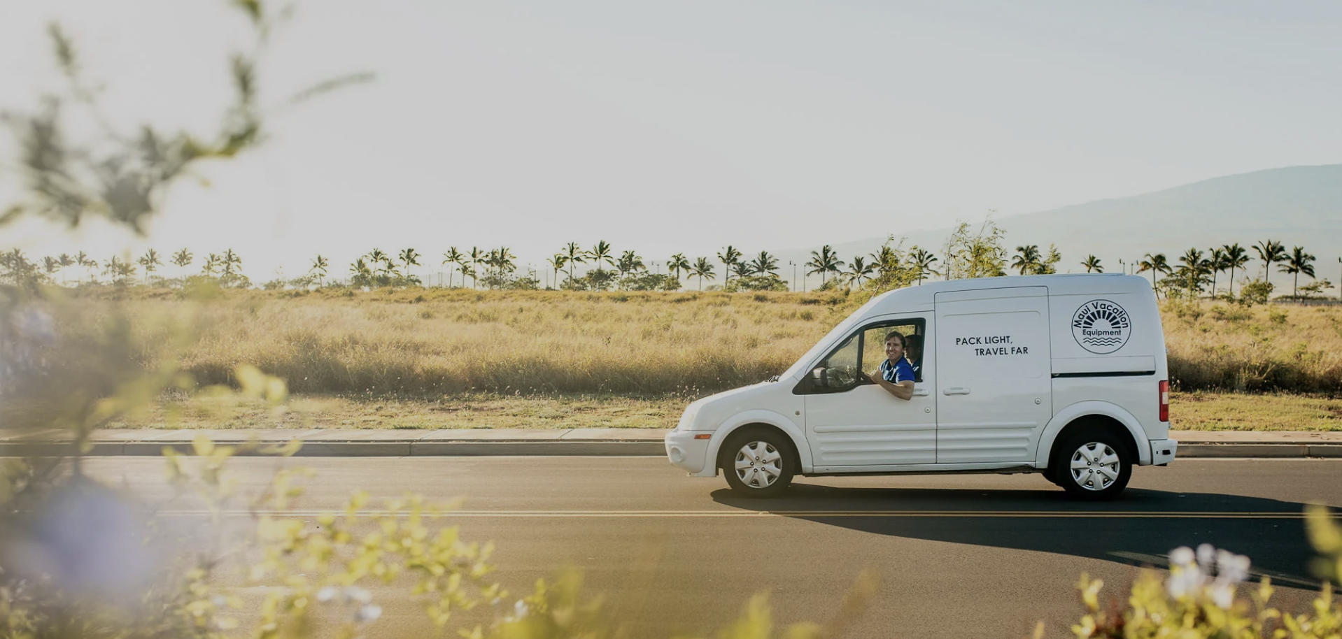 Maui Vacation Equipment delivery van transporting baby and beach rental gear across Maui.