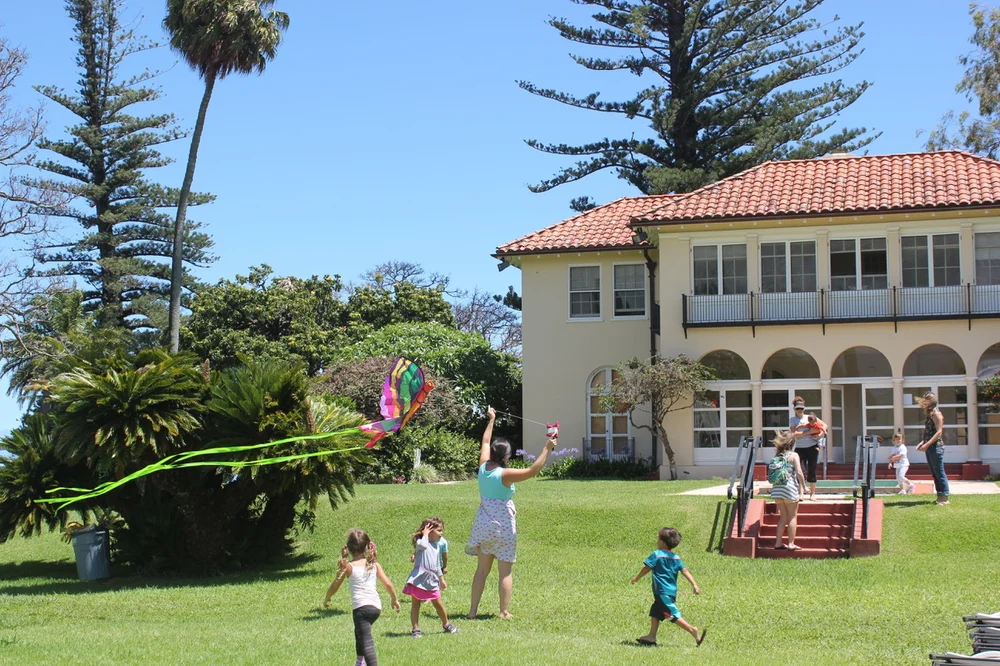 Kids participating in a family art activity at Hui Noʻeau on Maui