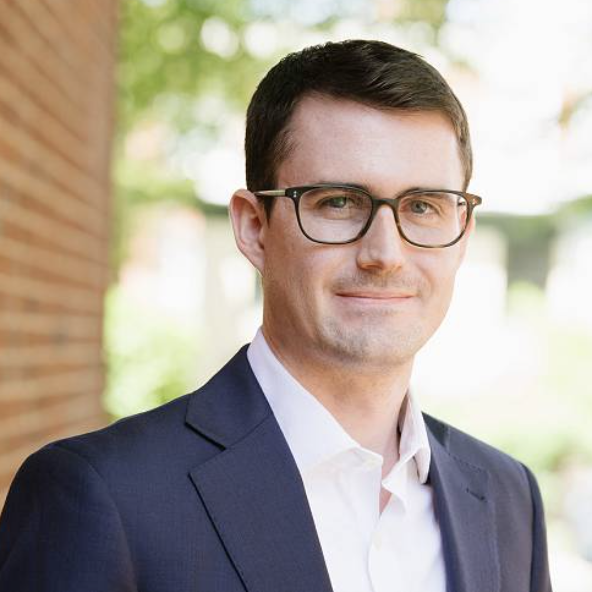 A headshot of Jake Robbins, Director and Investment Committee Member of Anchor Health Capital
