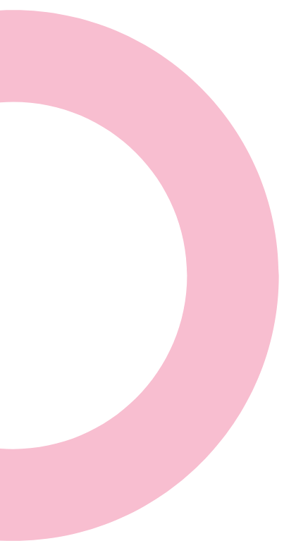 Close-up of a pink doughnut with no toppings, partially visible on a black background.