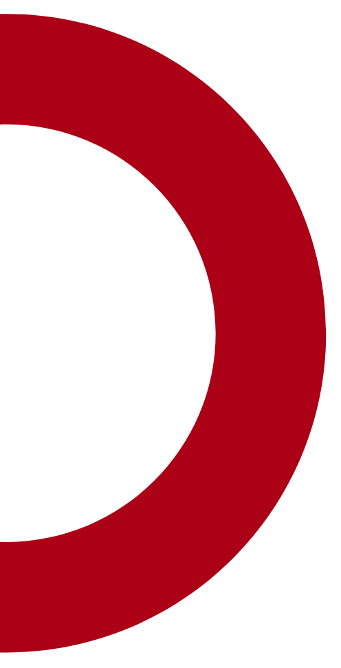 Close-up of a red circle with a black background.