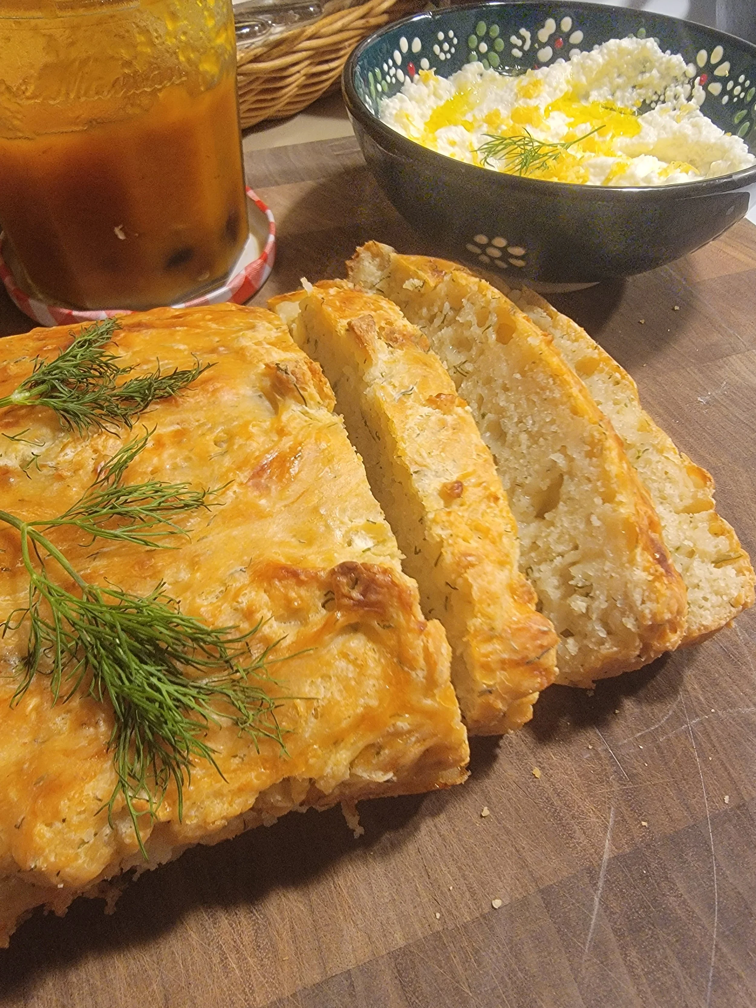 Homemade cottage cheese, roasted garlic, and dill bread served with fresh whipped ricotta finished with olive oil and lemon zest and homemade mango chutney. Ultimate charcuterie flex!